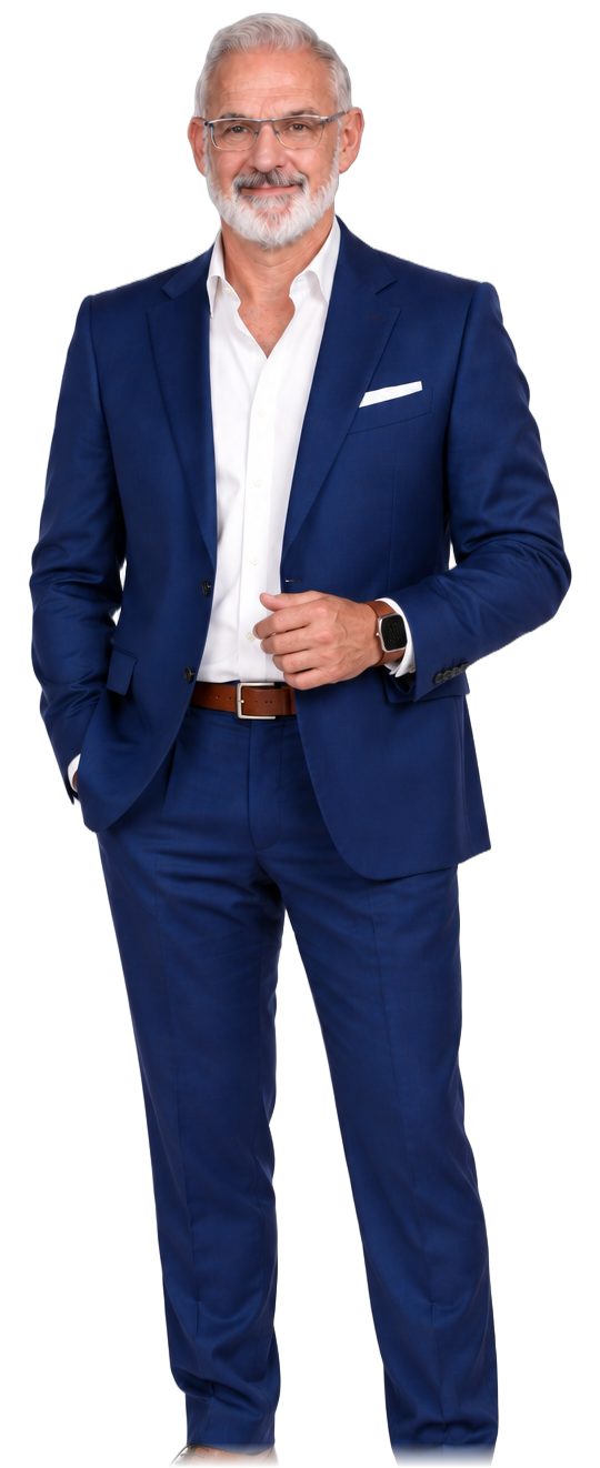 Adrian Heywood in a royal blue suit, studio portrait
